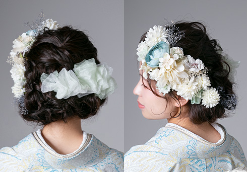 ヘアアレンジ：ゆるふわにまとめた髪に清廉な印象のたくさんの花とチュールの髪飾りを合わせた成人式ヘアアレンジ